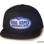 A black foam cap with a king ropes sheridan label