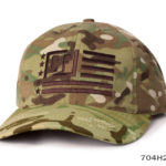 A green sports cap with burgundy flag label