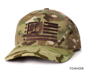 A green sports cap with burgundy flag label