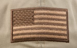 An American Flag Embroidered in Dull Colors