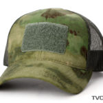 A tactical camo colored sports cap with net