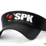 A black SPK Communications technologies cap