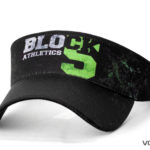 A black block athletics cap with neon logo