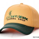 A Winterfield Floral Shop Logo on a Yellow and Green Cap