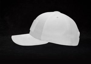 A white baseball cap on a black background.