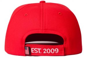 A red hat with the word est 2009 on it.