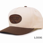 Beige and brown cap with logo.