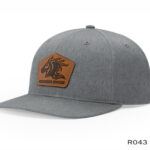Gray cap with leather patch logo.